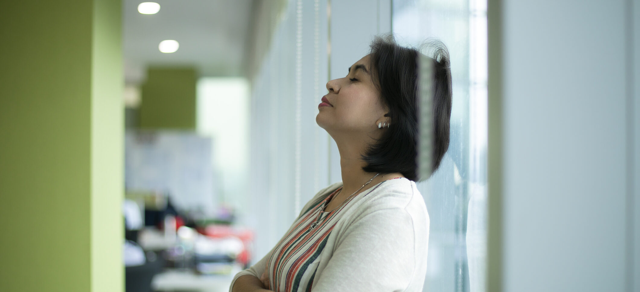 Woman experiencing burnout in the workplace